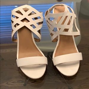 Laser cut out high heeled sandals